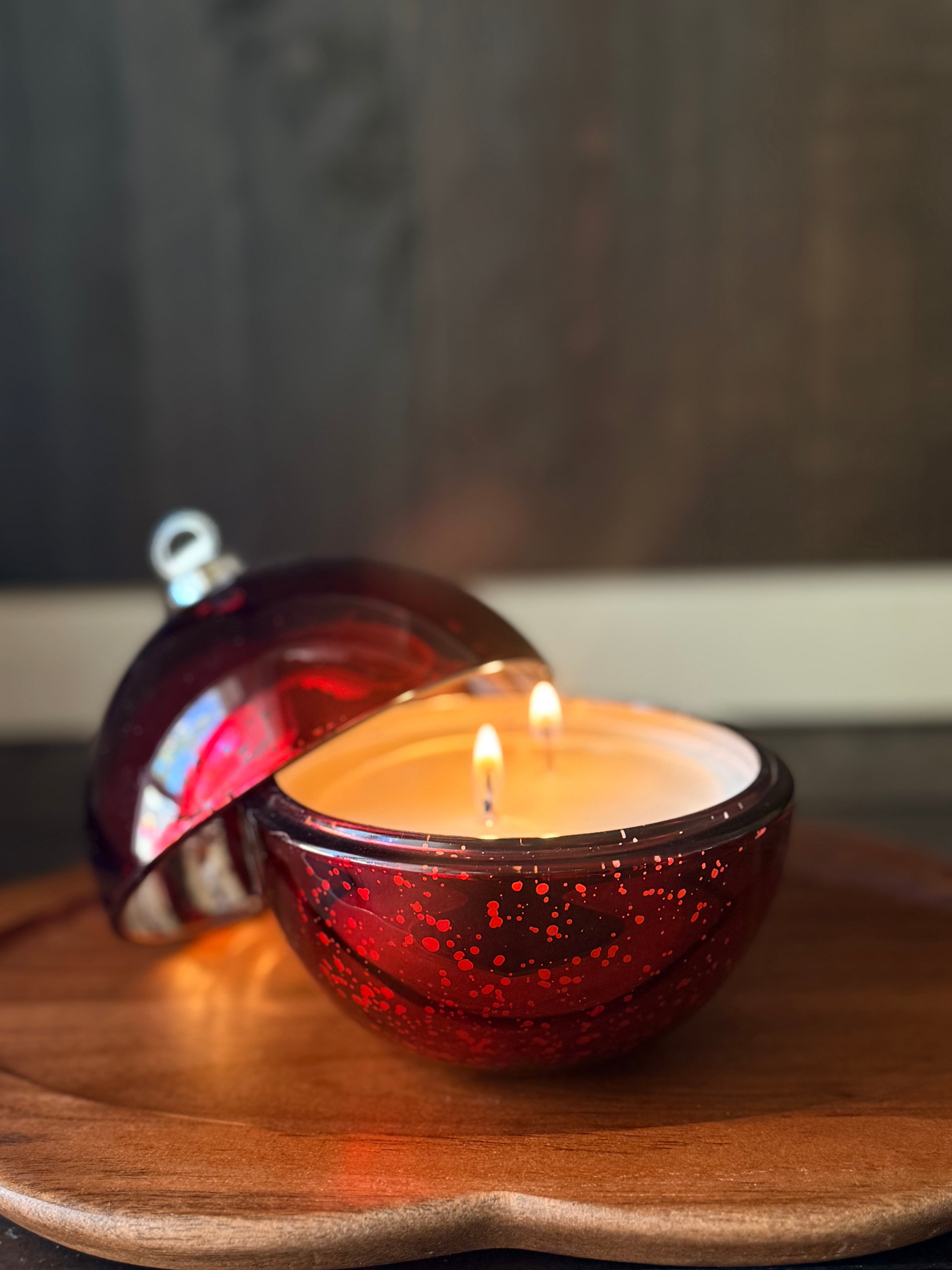 Jolly Jewel: 7oz Red Ornament Candle.  Fruity•Clove•Vanilla